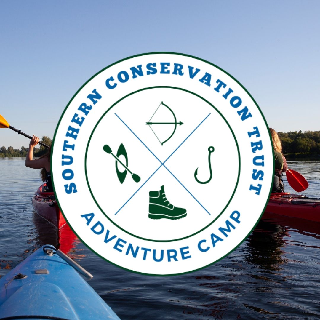 A logo for the southern conservation trust adventure camp