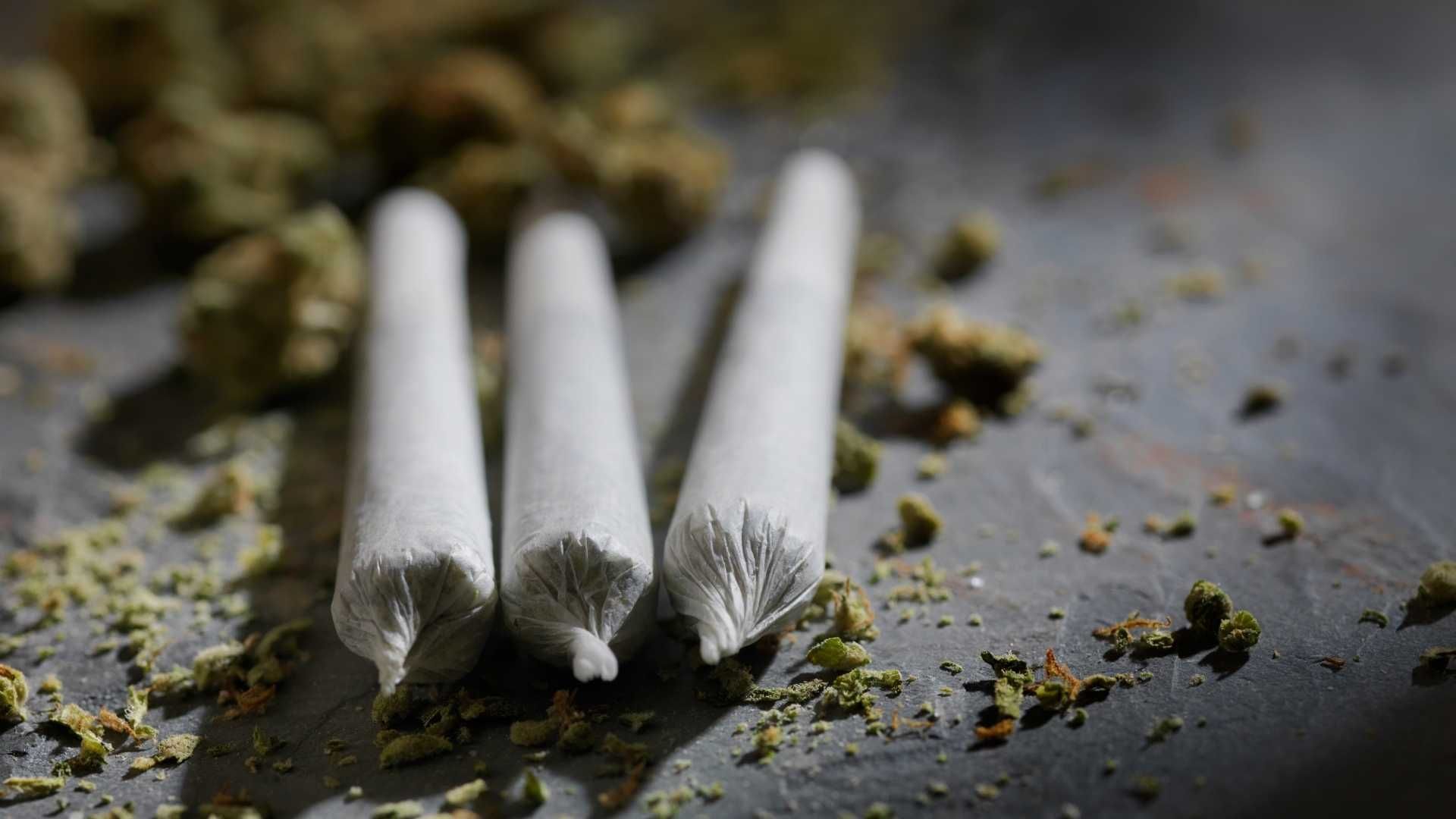 three rolled joints of marijauna