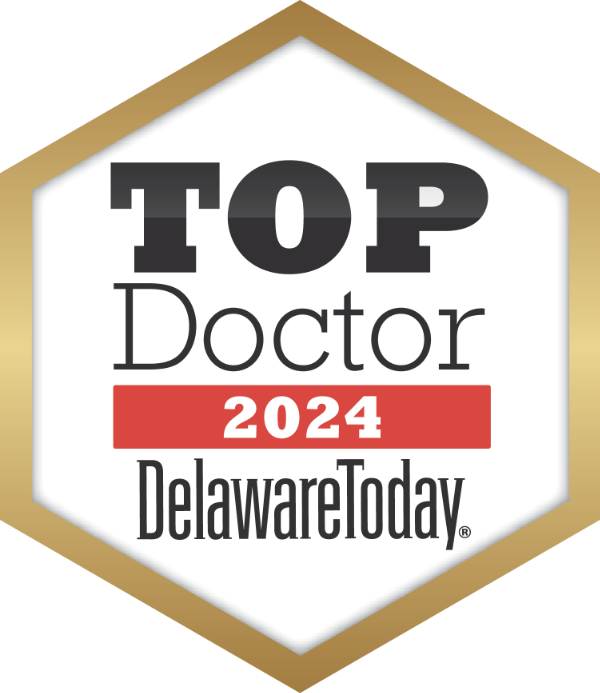 A badge that says top doctor 2024 delaware today