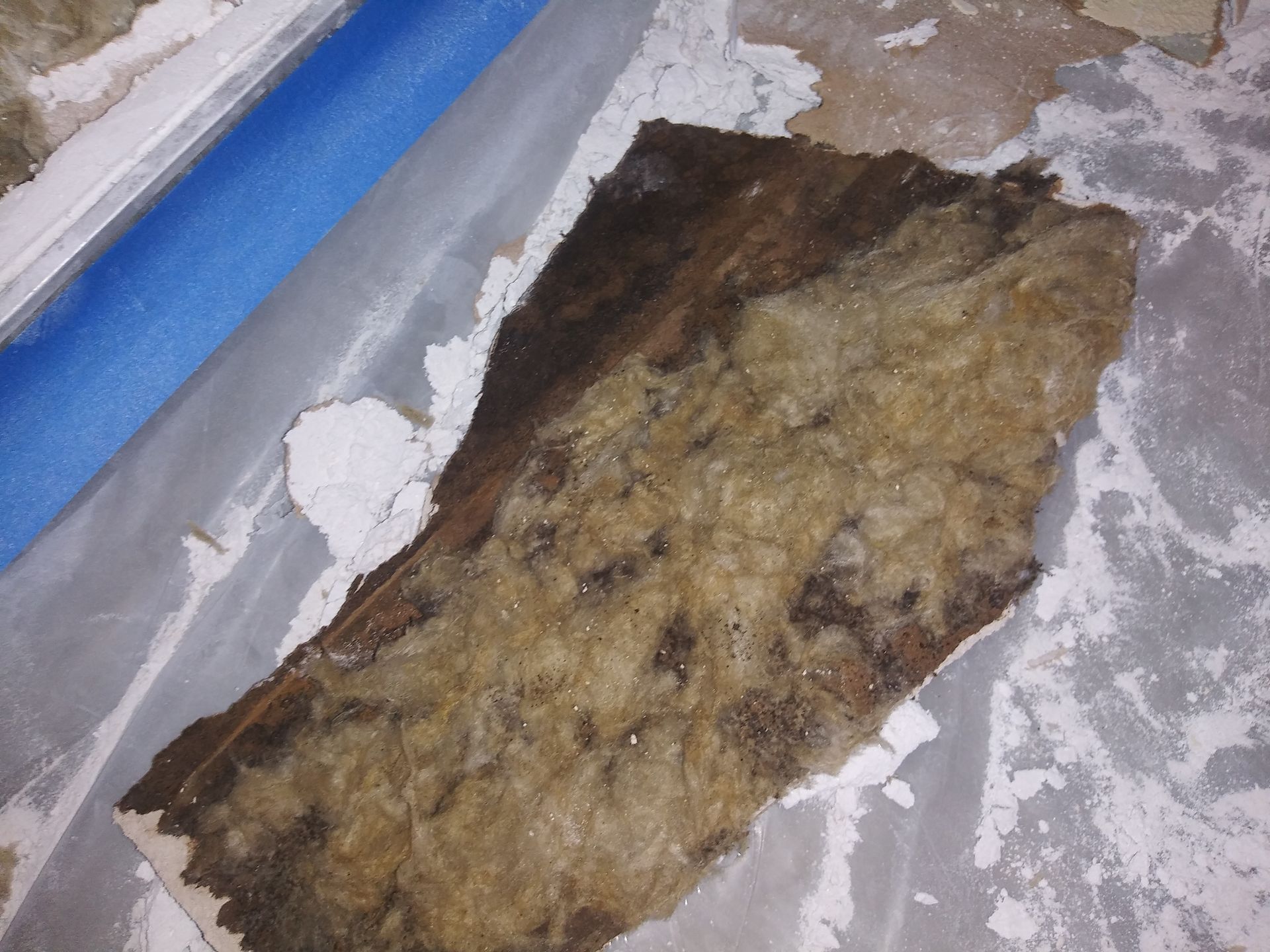 A piece of rock wool is laying on the floor