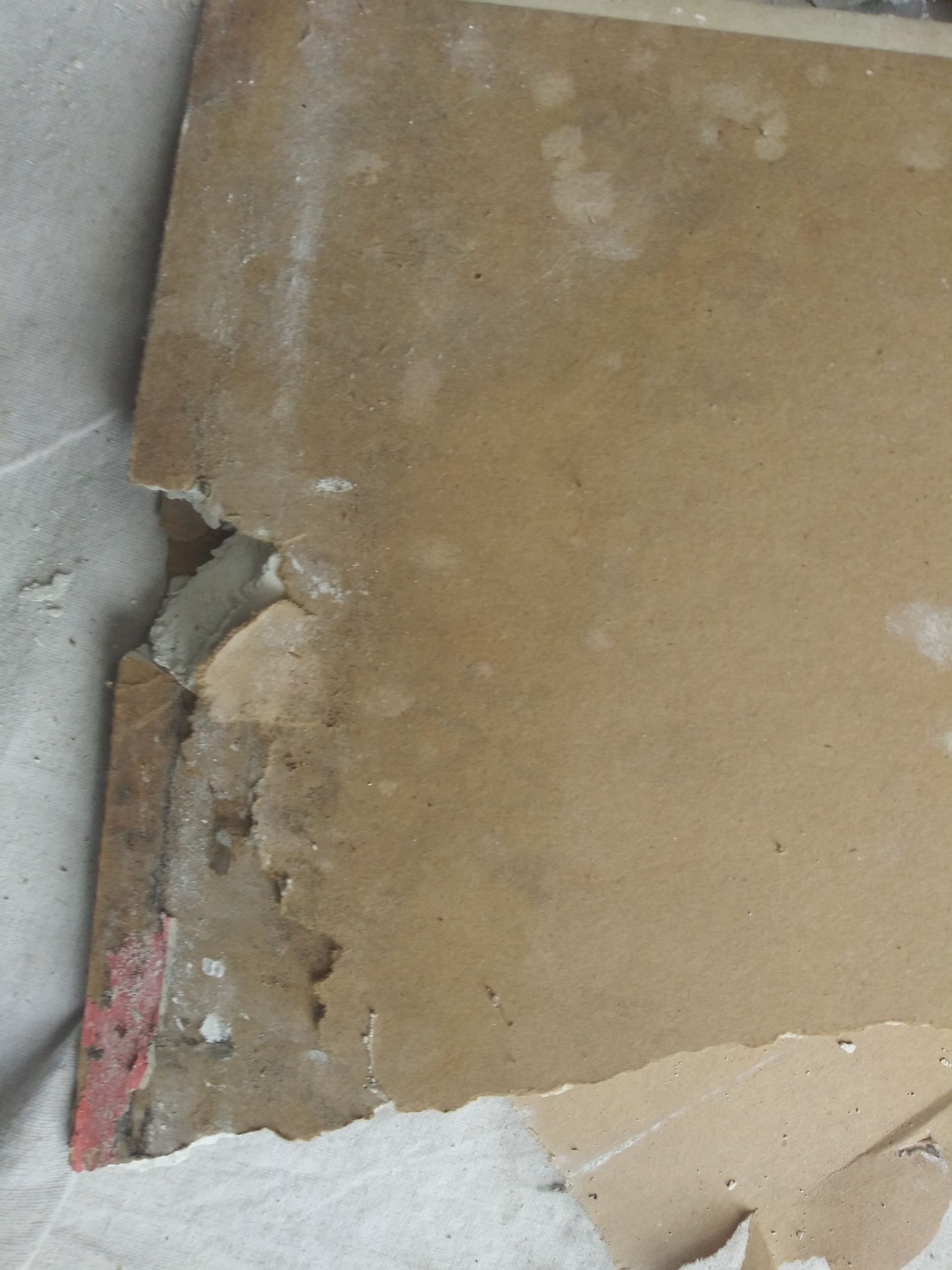 A piece of cardboard with a hole in it