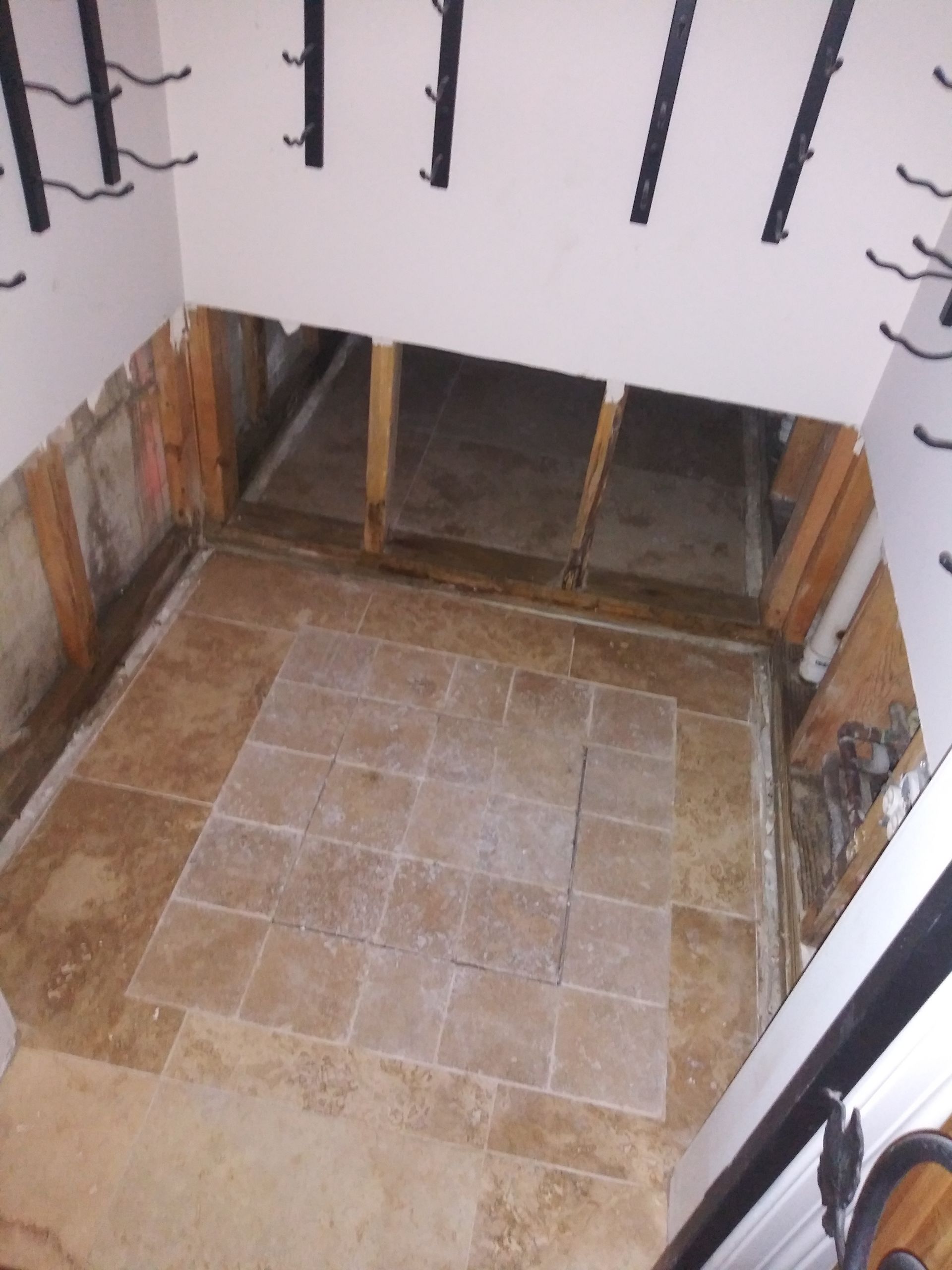 An aerial view of a room with a tiled floor