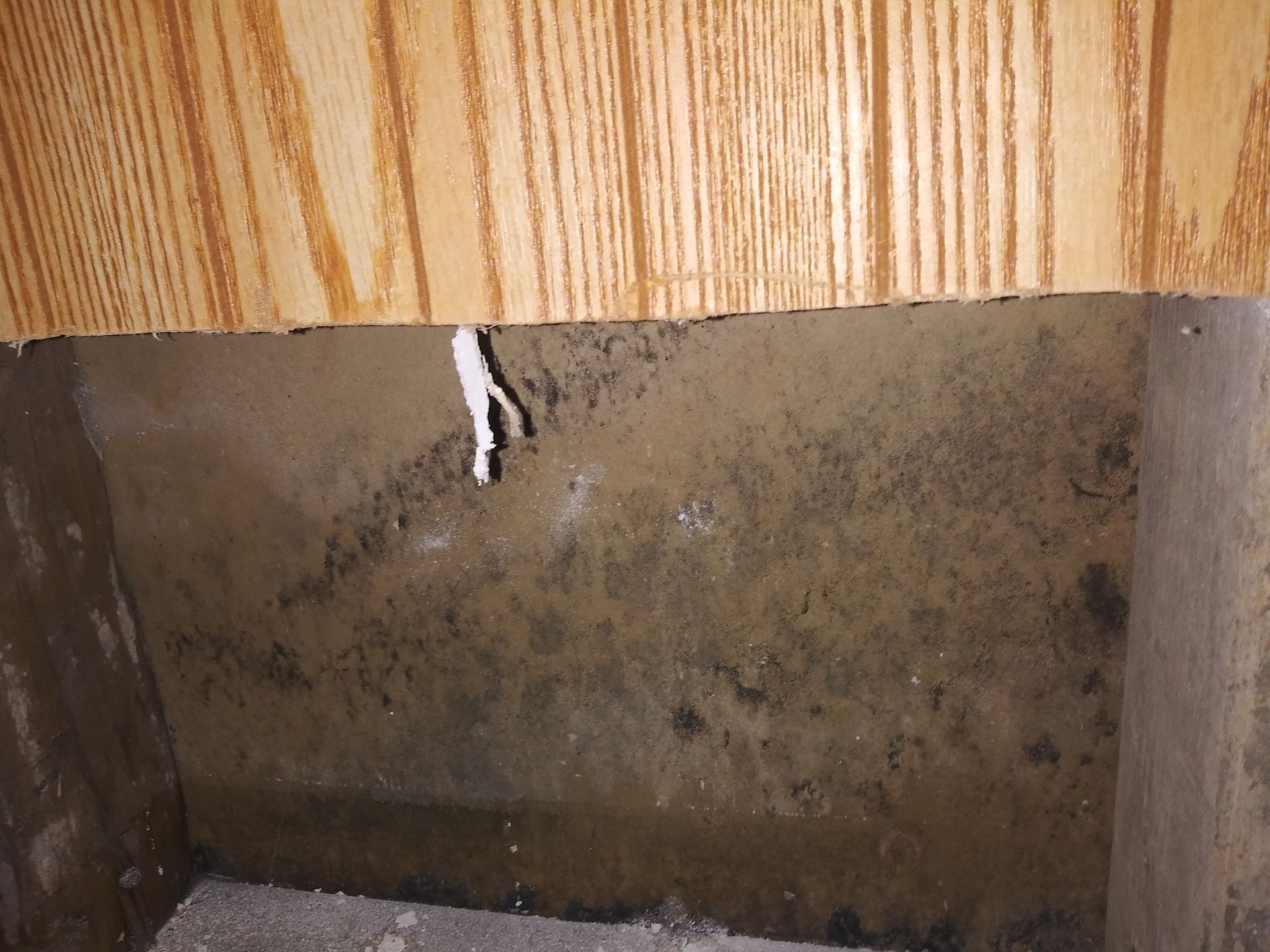 There is a hole in the wall that looks like a hole in the floor.