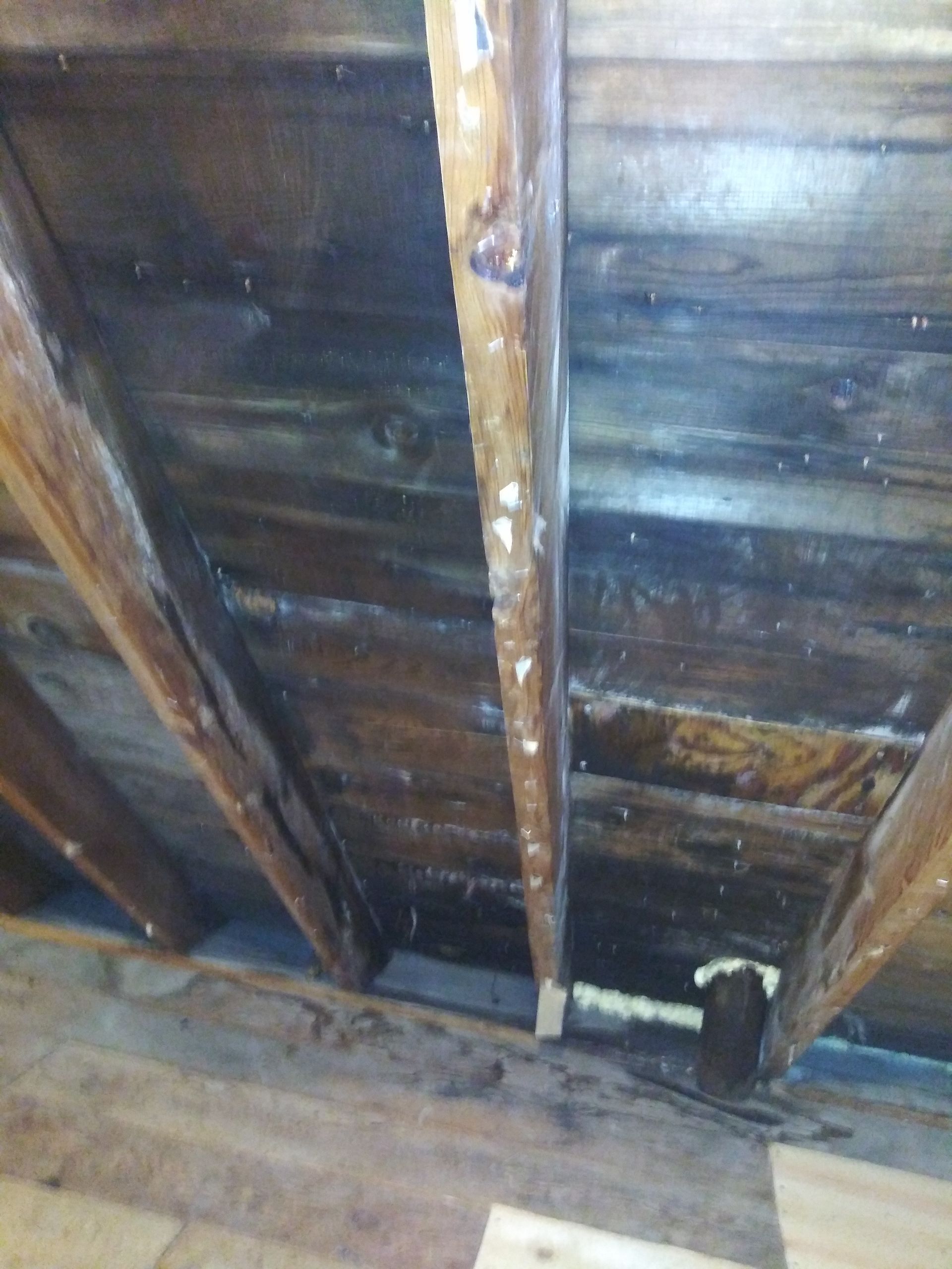 A close up of a wooden ceiling in a house