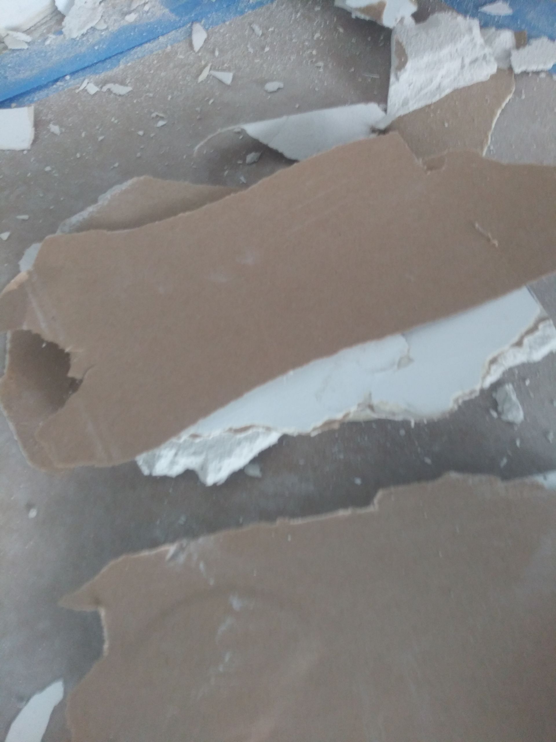 Two pieces of cardboard are laying on a table