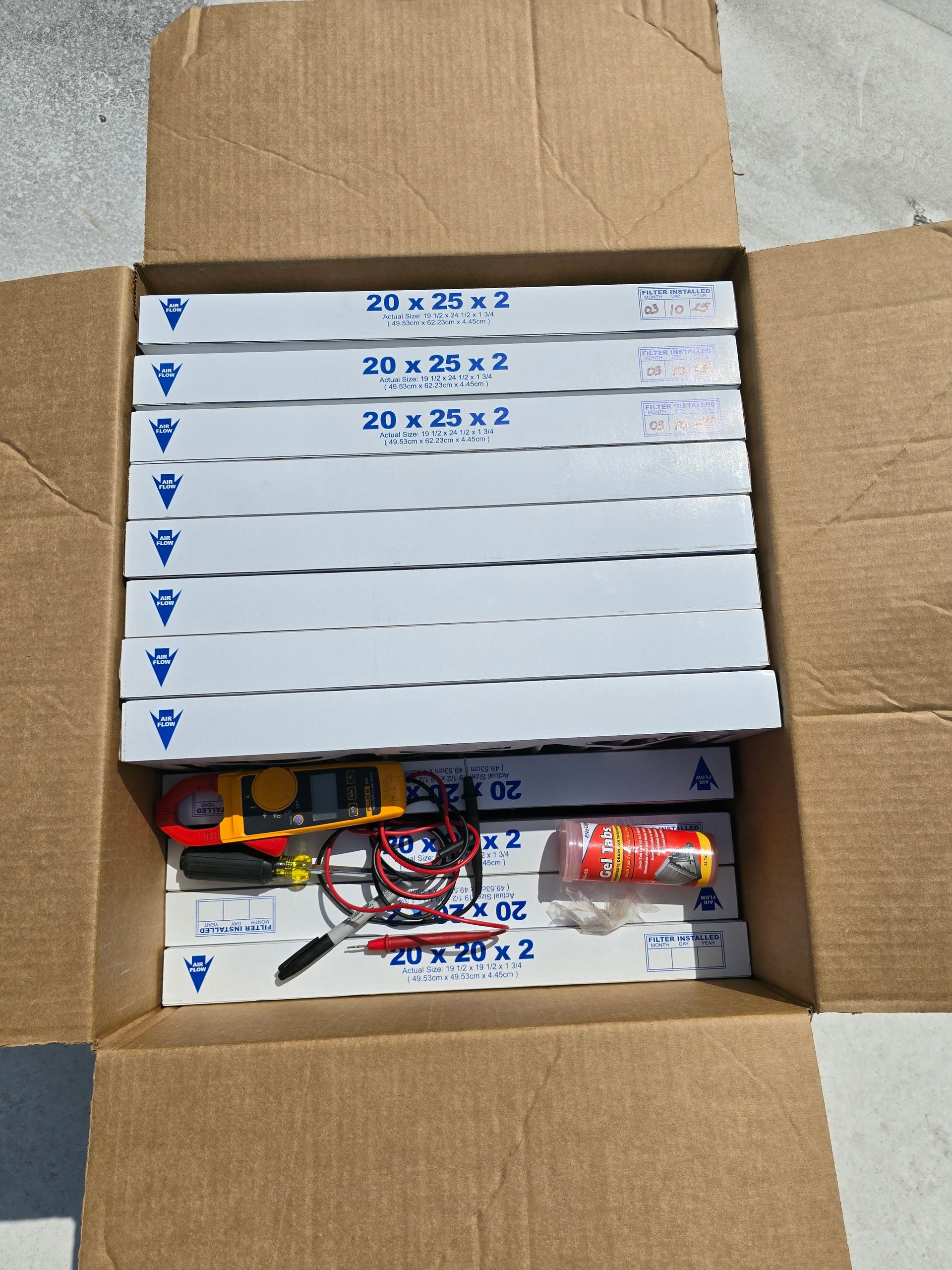 A cardboard box with a bunch of boxes in it