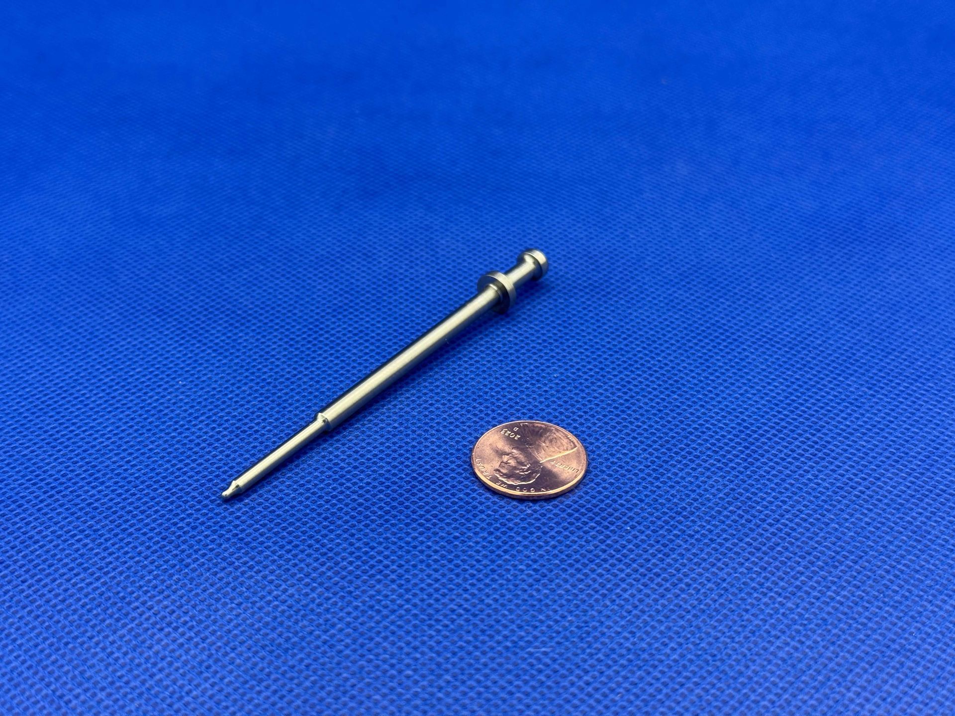 A bunch of metal rods are stacked on top of each other