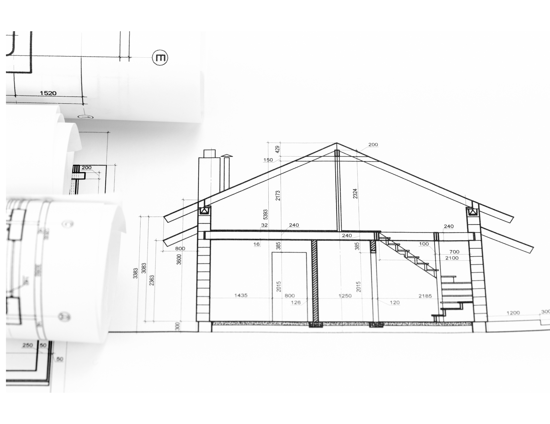 A technical architectural cross-section drawing of a small house with a pitched roof and internal staircase.