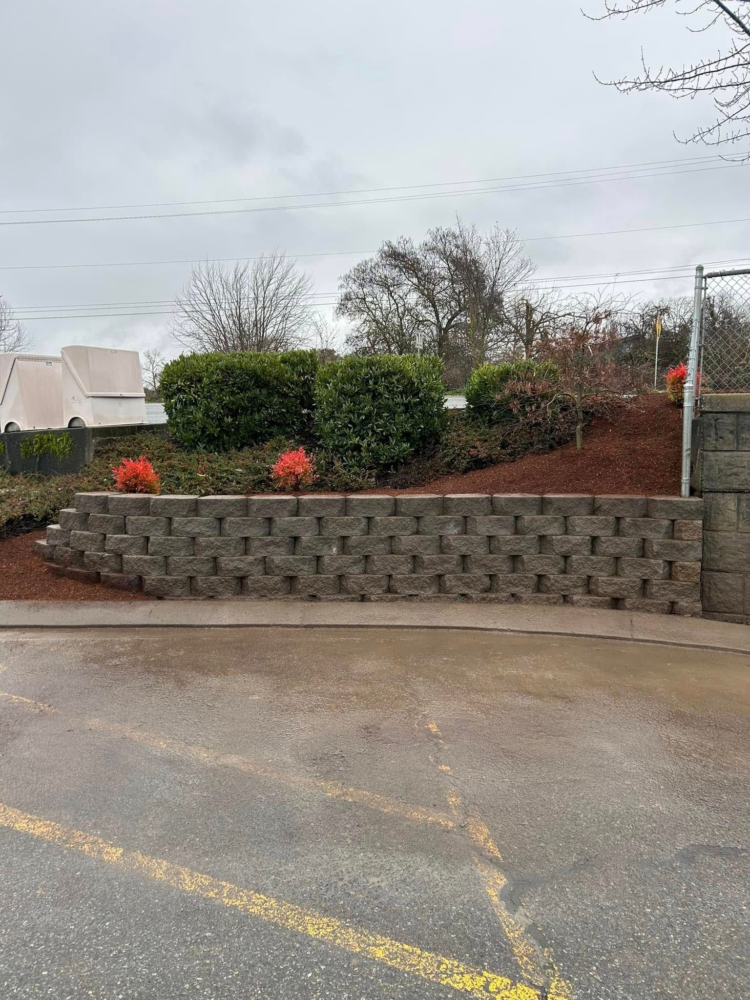 There is a brick wall in the middle of the road.