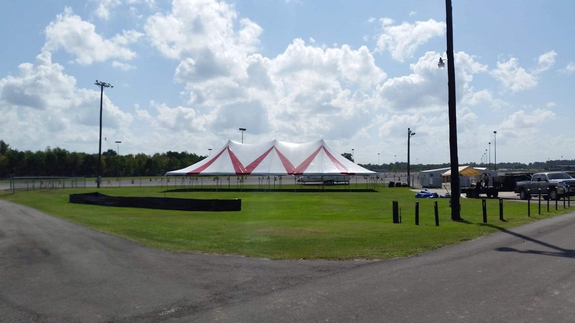 Tent Set Up On Large Open Ground — Jackson, MS — All Seasons Events