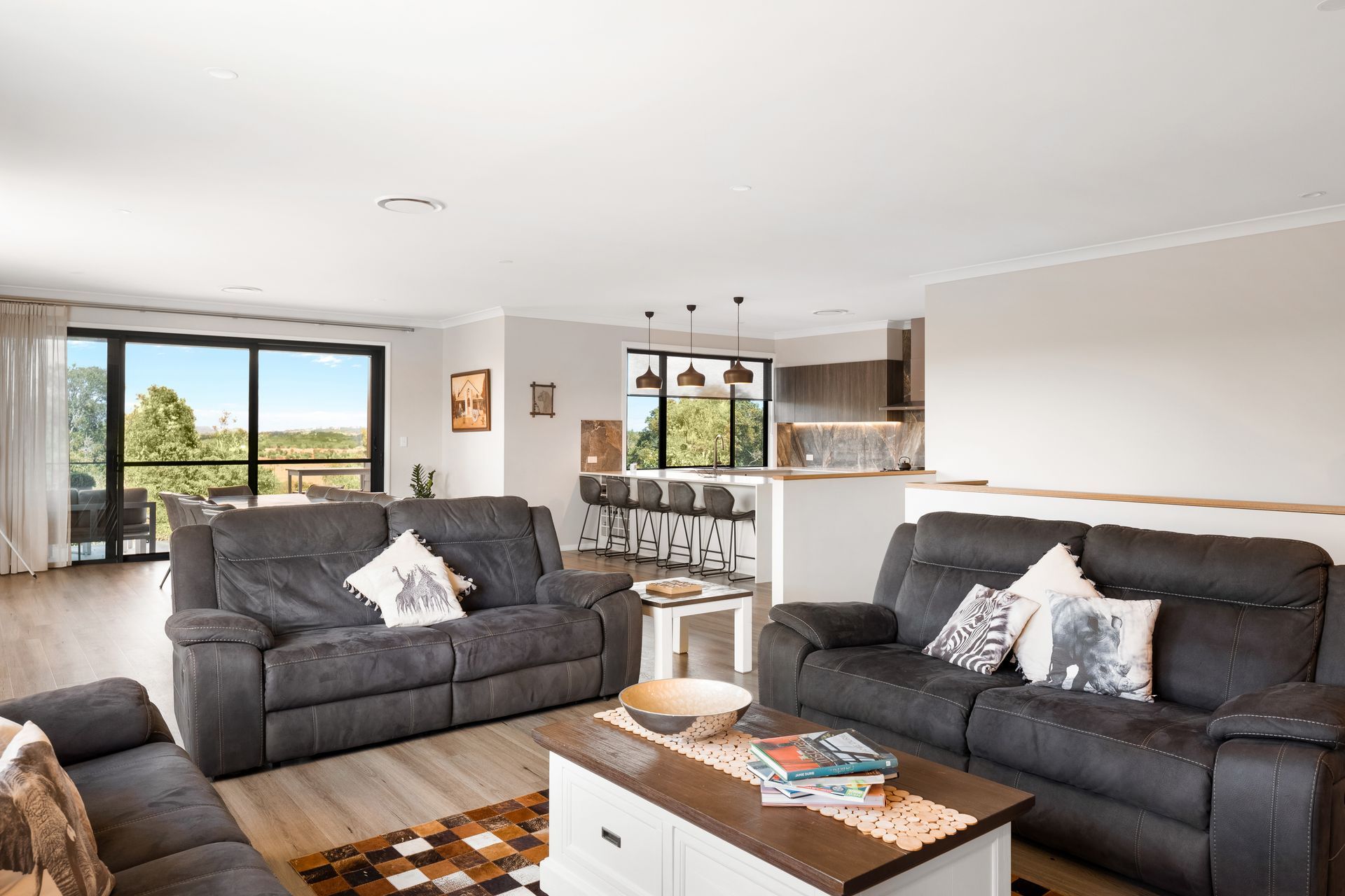 a living room filled with furniture and a coffee table .