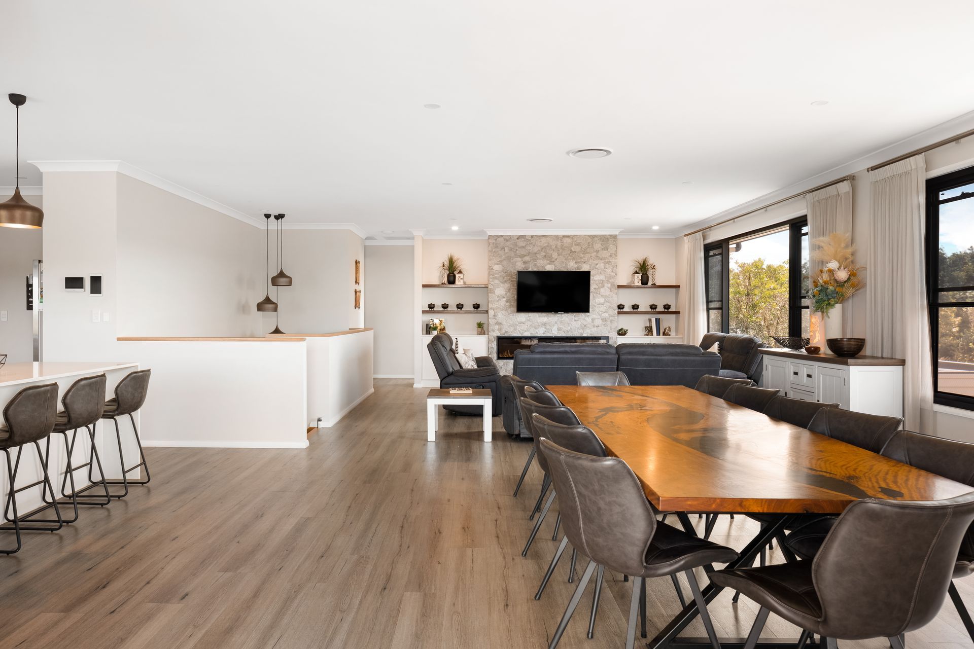 there is a large table in the middle of the room .