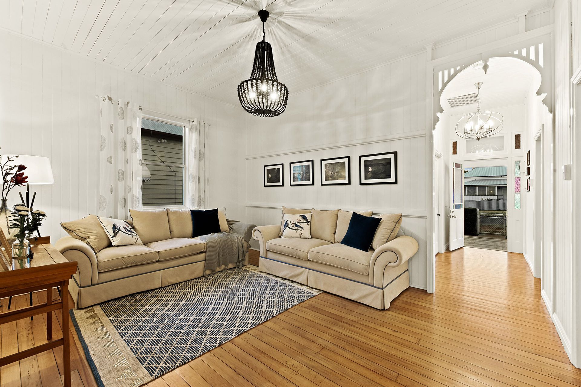 a living room with two couches and a rug