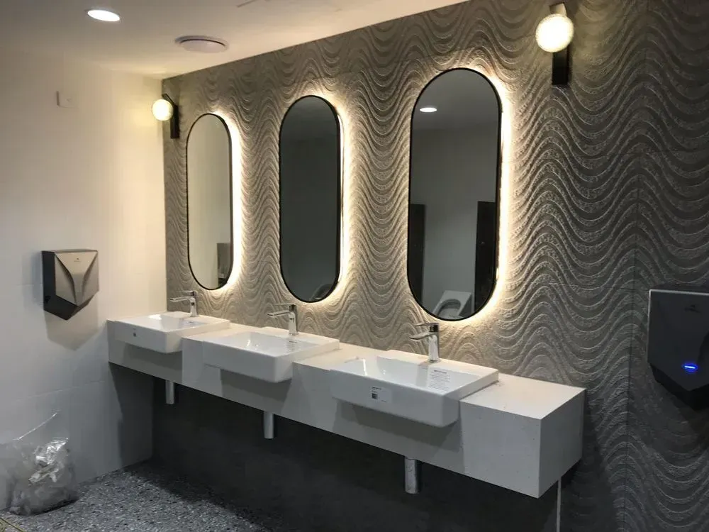 A Bathroom Vanity With Three Sinks And Three Mirrors — PKJ Designs in Unanderra, NSW