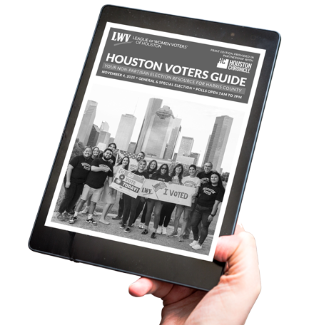 A person holding a tablet displaying a Houston Voters Guide.