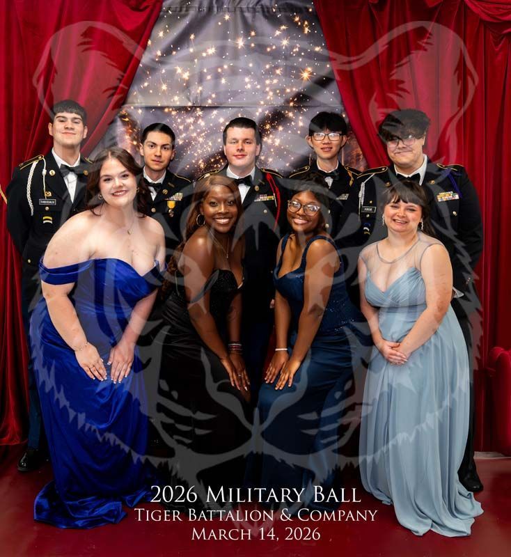A group of five people in formal attire and five in military dress uniforms pose for a photo at the 2026 Military Ball.