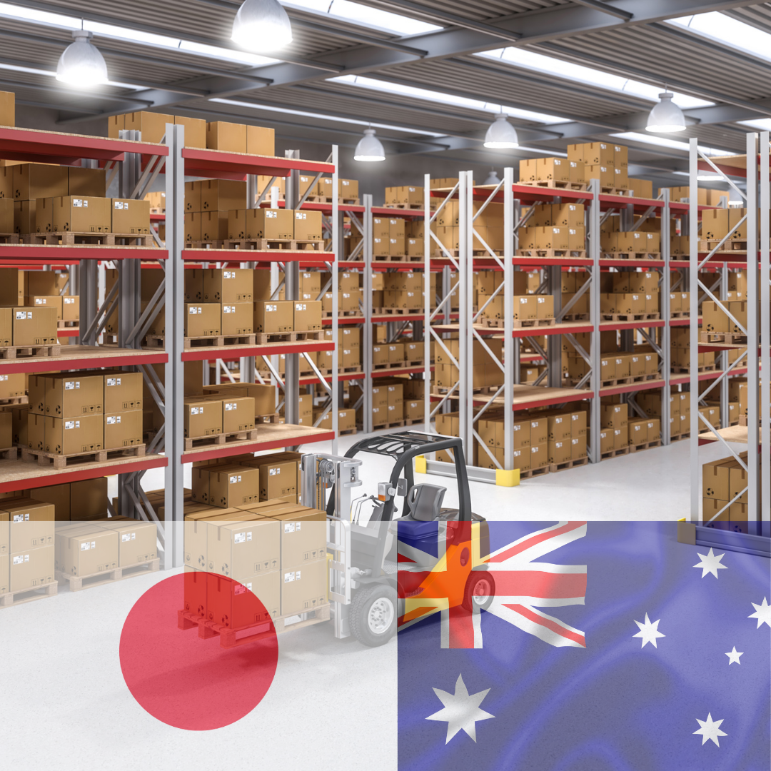 A forklift is moving boxes in a warehouse with a flag in the background