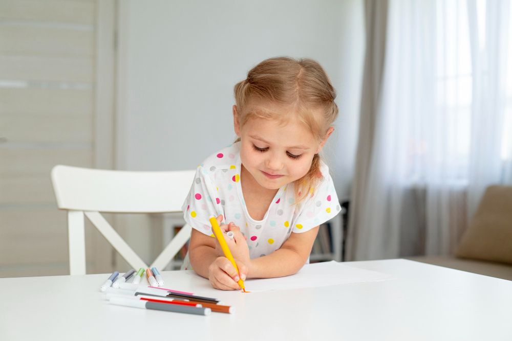 a kid coloring a book