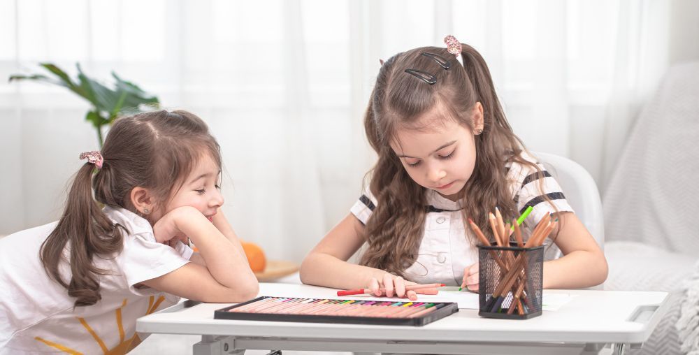 kids coloring a book