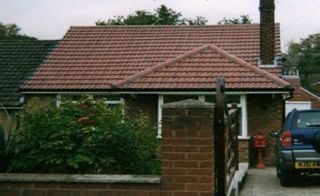 TIled roof with chimney
