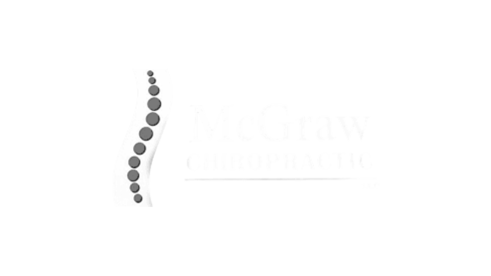 A black and white image of a spine with circles on it.