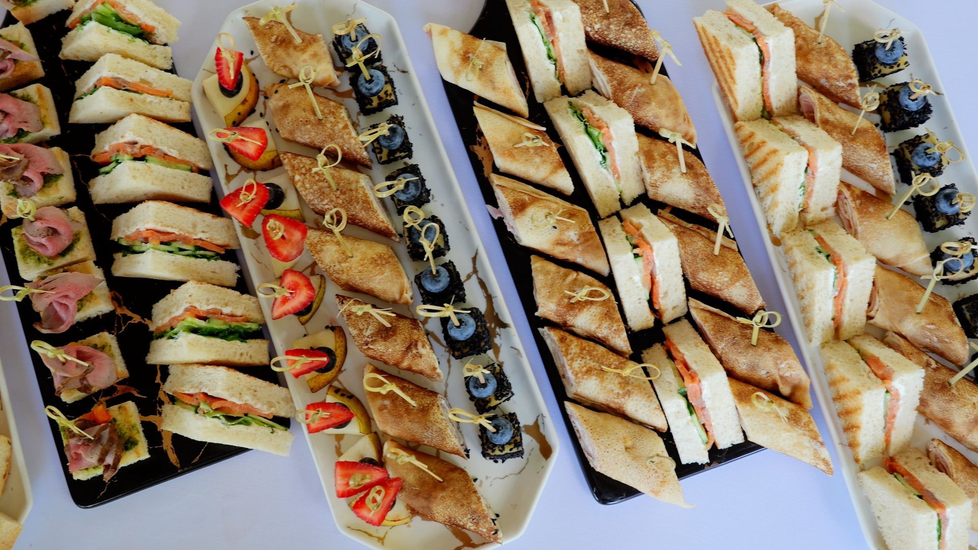 A close up of a piece of food on a plate with a fork