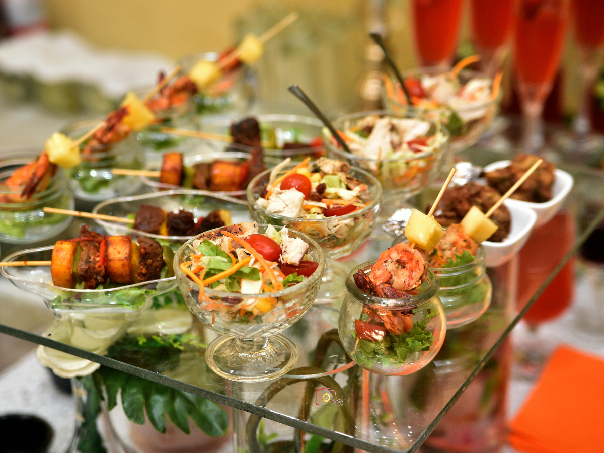 Slices of bread and figs on a wooden cutting board