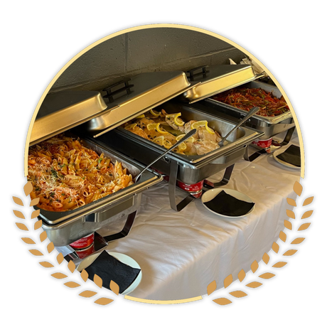 A buffet table with a variety of food on it from Happy Hour Bar & Grill