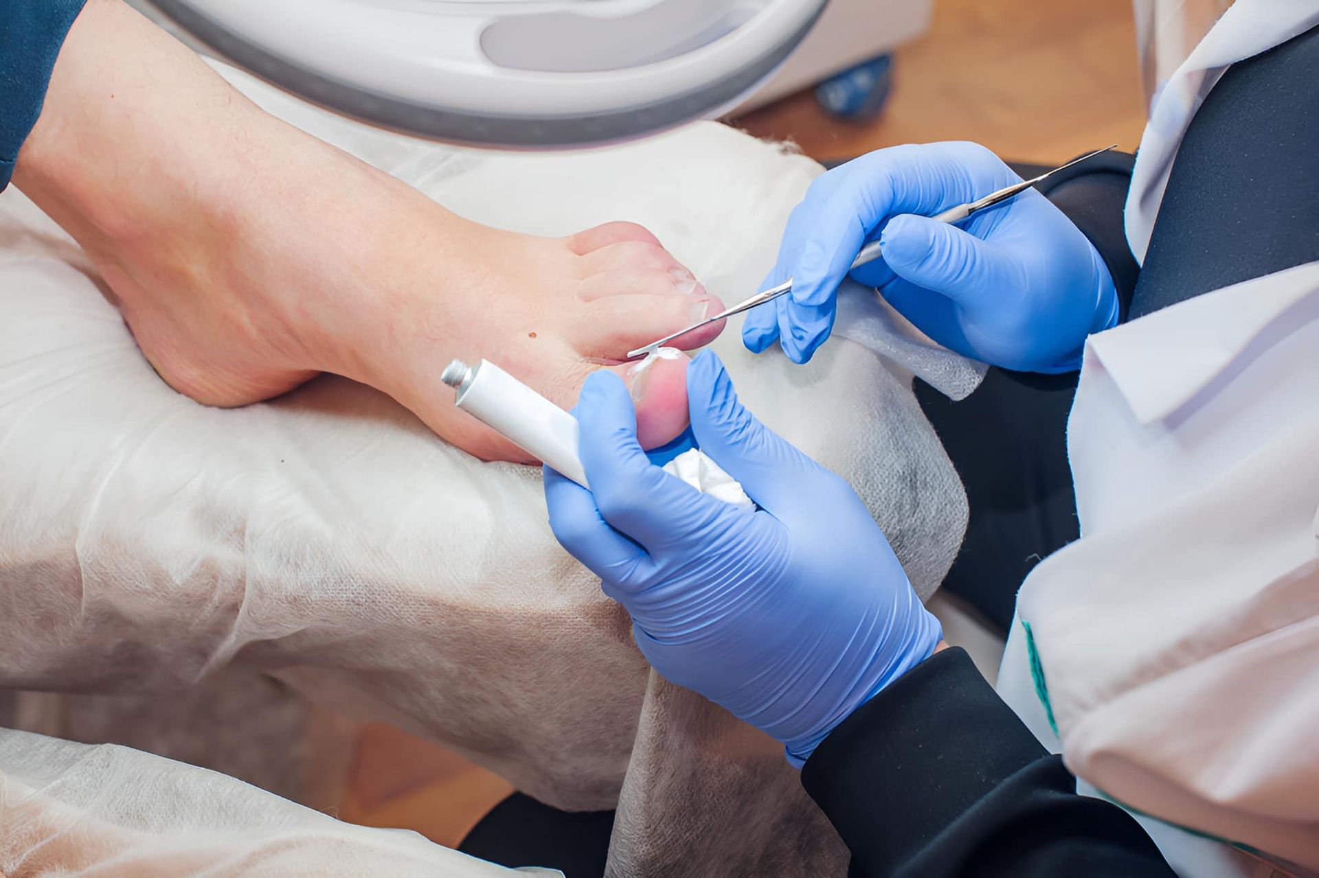 A Person Is Getting Their Toenails Done By A Podiatrist — Hastings Podiatry Centre In Port Macquarie, NSW
