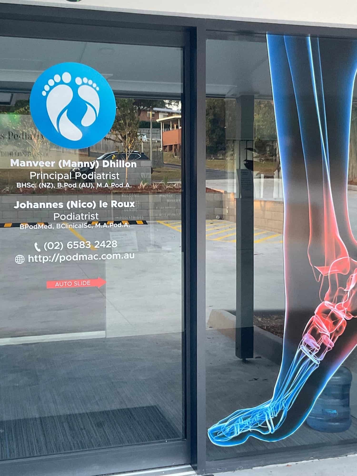 A Door With A Picture Of A Person's Foot On It — Hastings Podiatry Centre In Port Macquarie, NSW