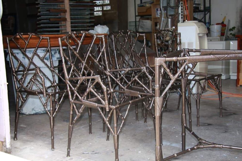 A bunch of chairs are lined up in a room