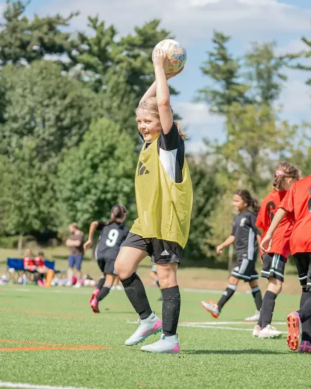 MSI travel players huddling before a game.
