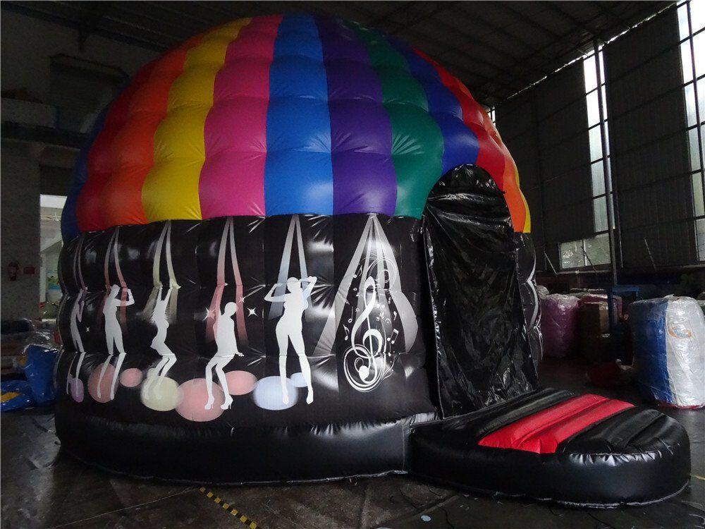 Inflatable disco dome with a rainbow-striped roof and a black base decorated with dancing figures.