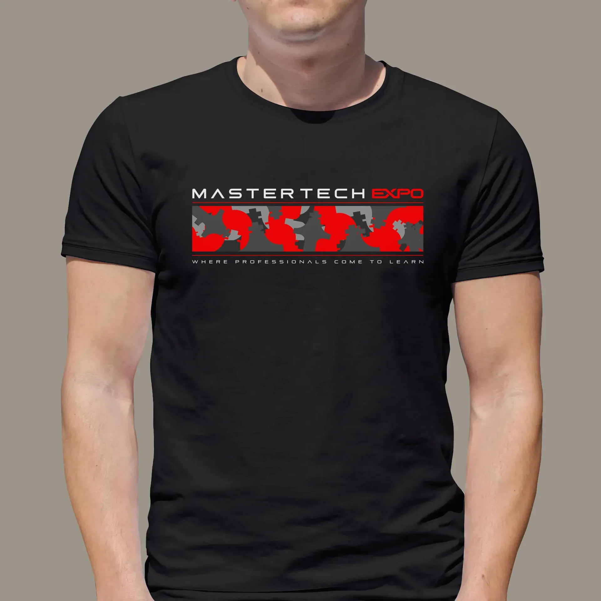 A man is wearing a black t-shirt that says mastertech expo