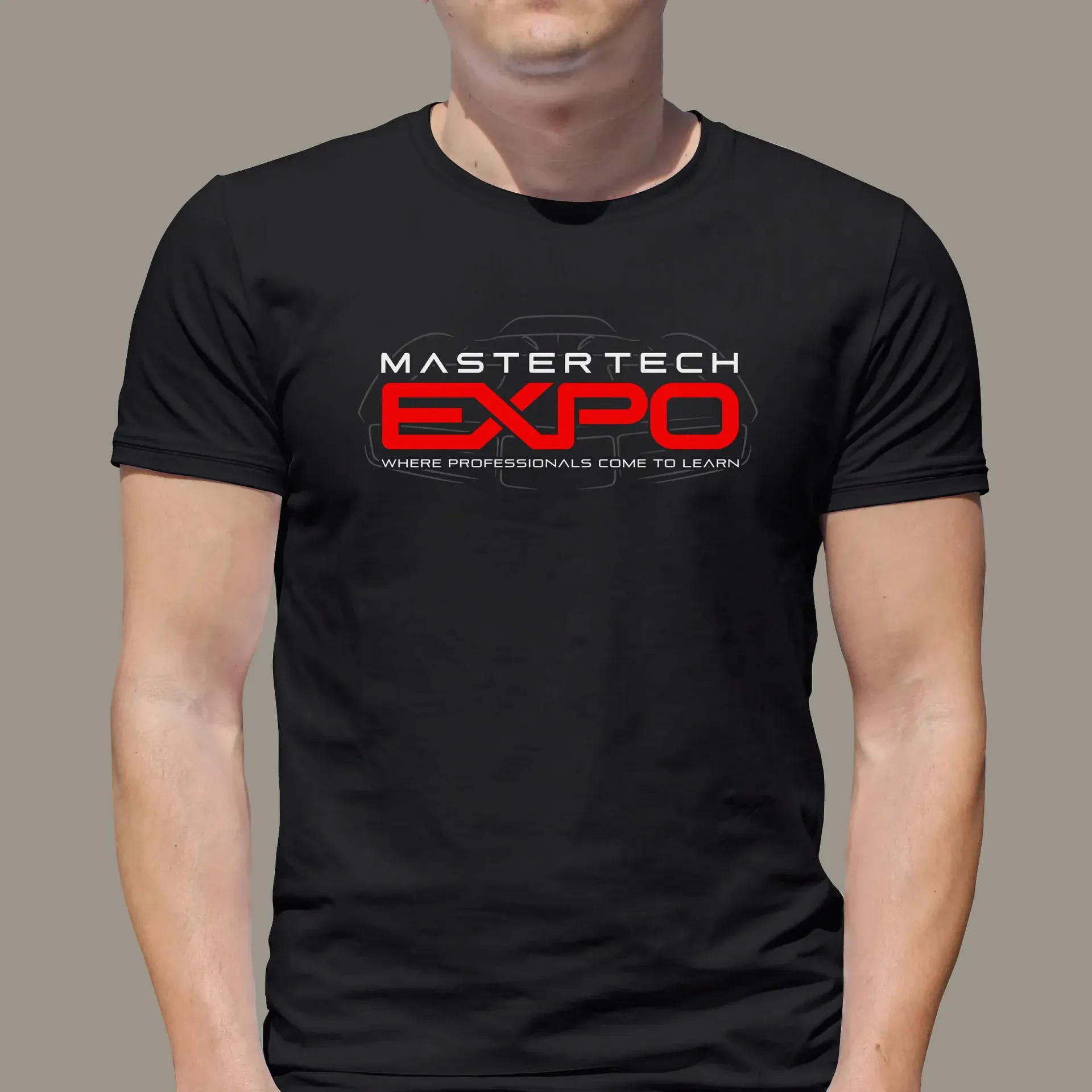 A man wearing a black mastertech expo t-shirt