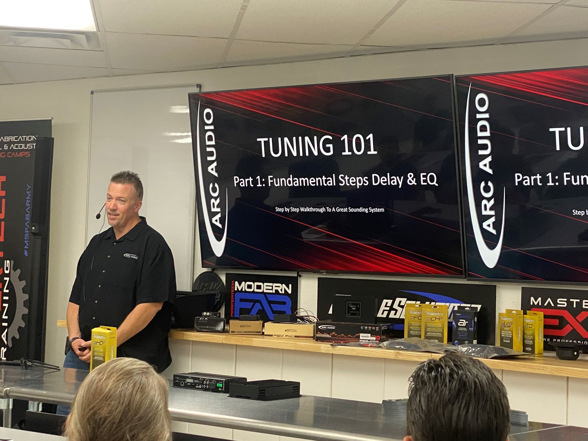 A man is giving a presentation about tuning 101