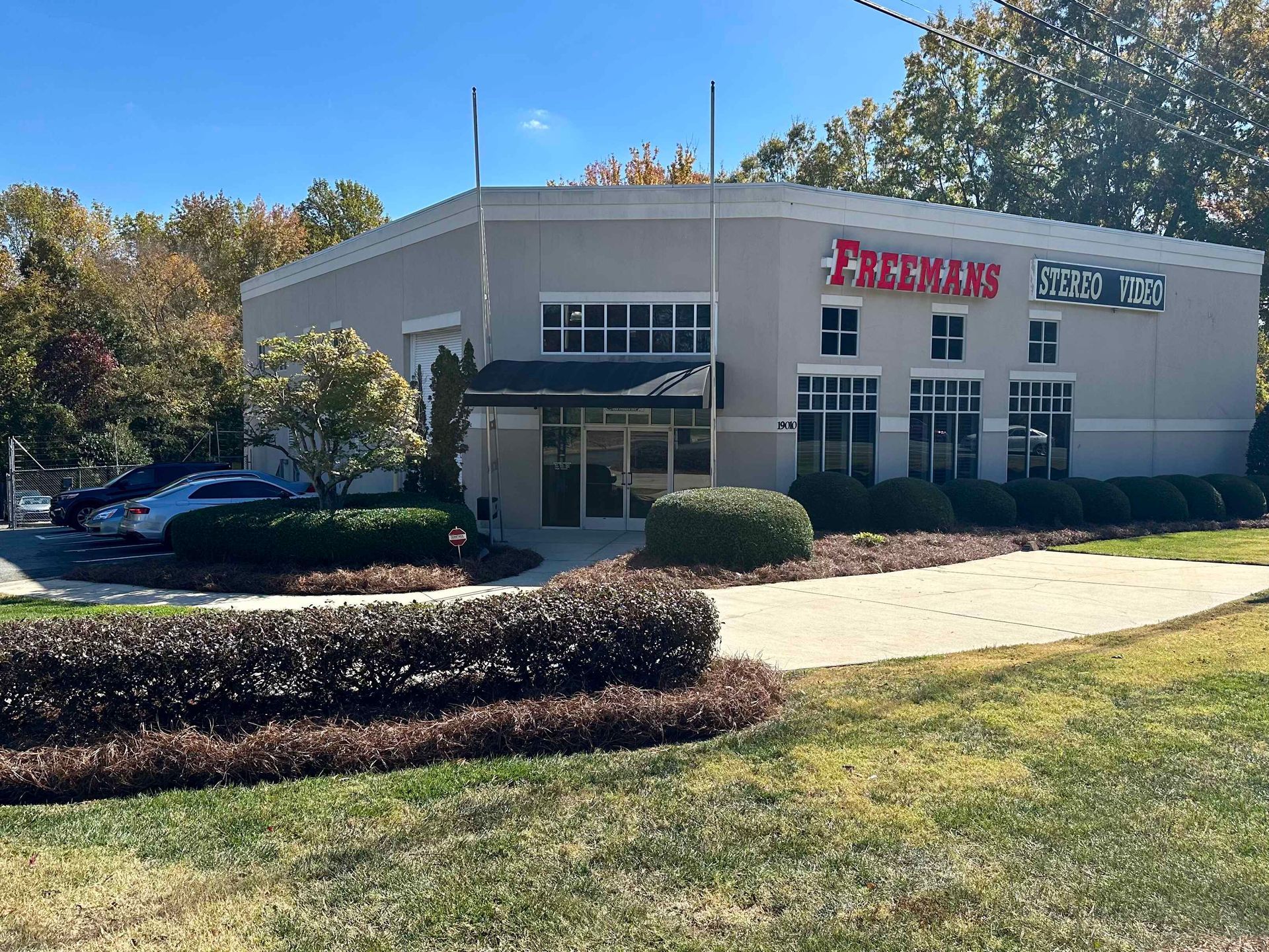 A large building with a red sign that says Freemans.