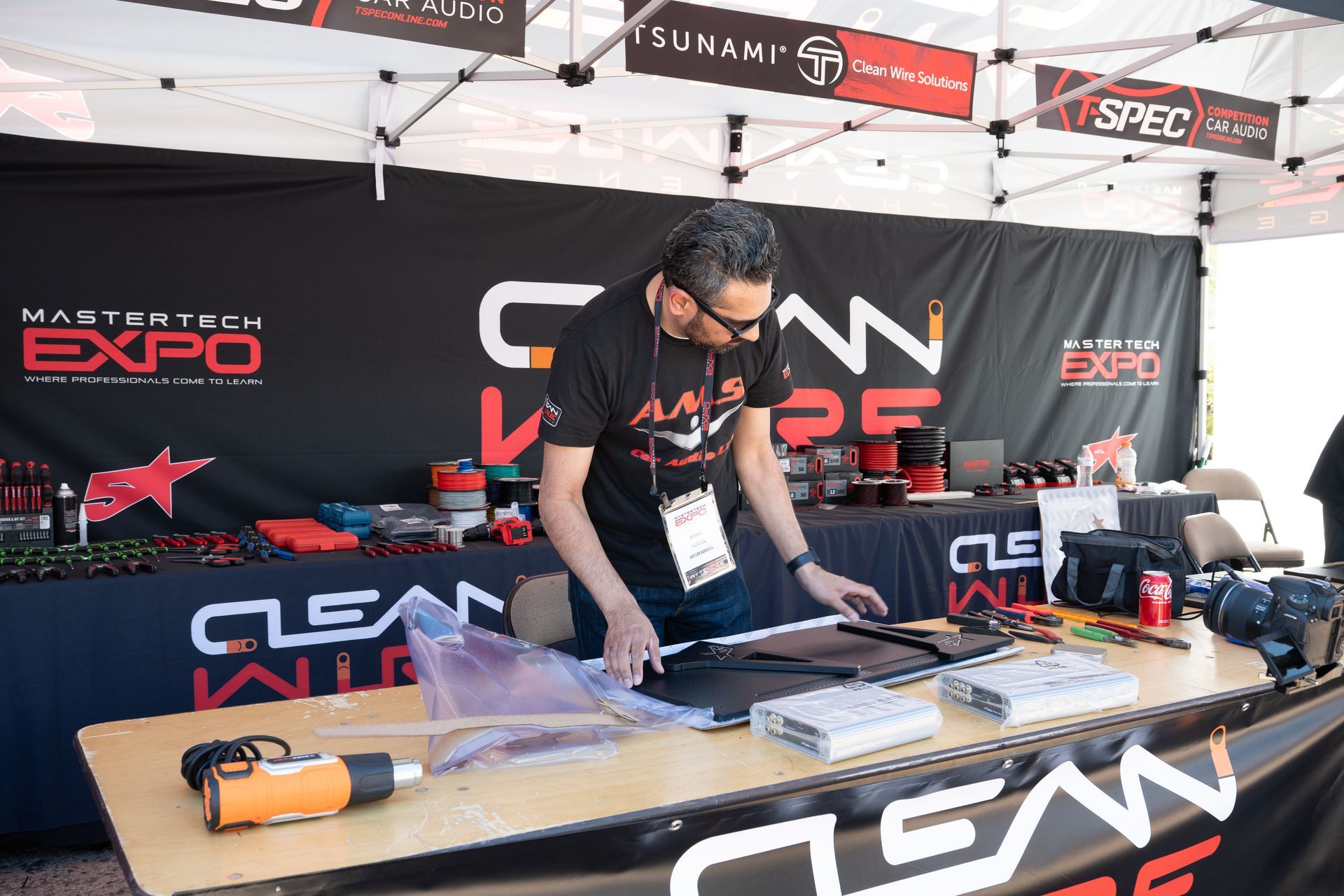 Man at a vendor booth with 