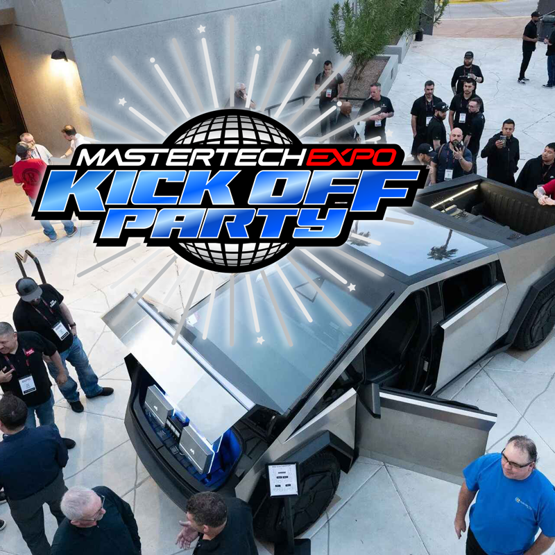 MasterTech Expo Kick Off Party with futuristic truck, people gathering outdoors.