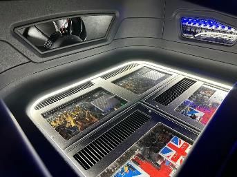 A close up of a car stereo system in a car.