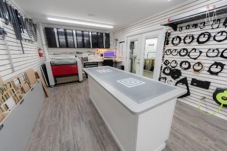 There is a large table in the middle of the room.