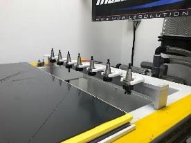 A machine is sitting on top of a table in a room.