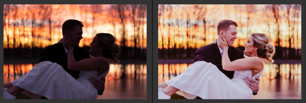 A man is carrying a bride in his arms in front of a lake.