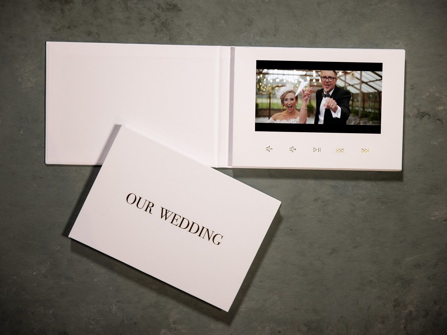 A card that says our wedding on it