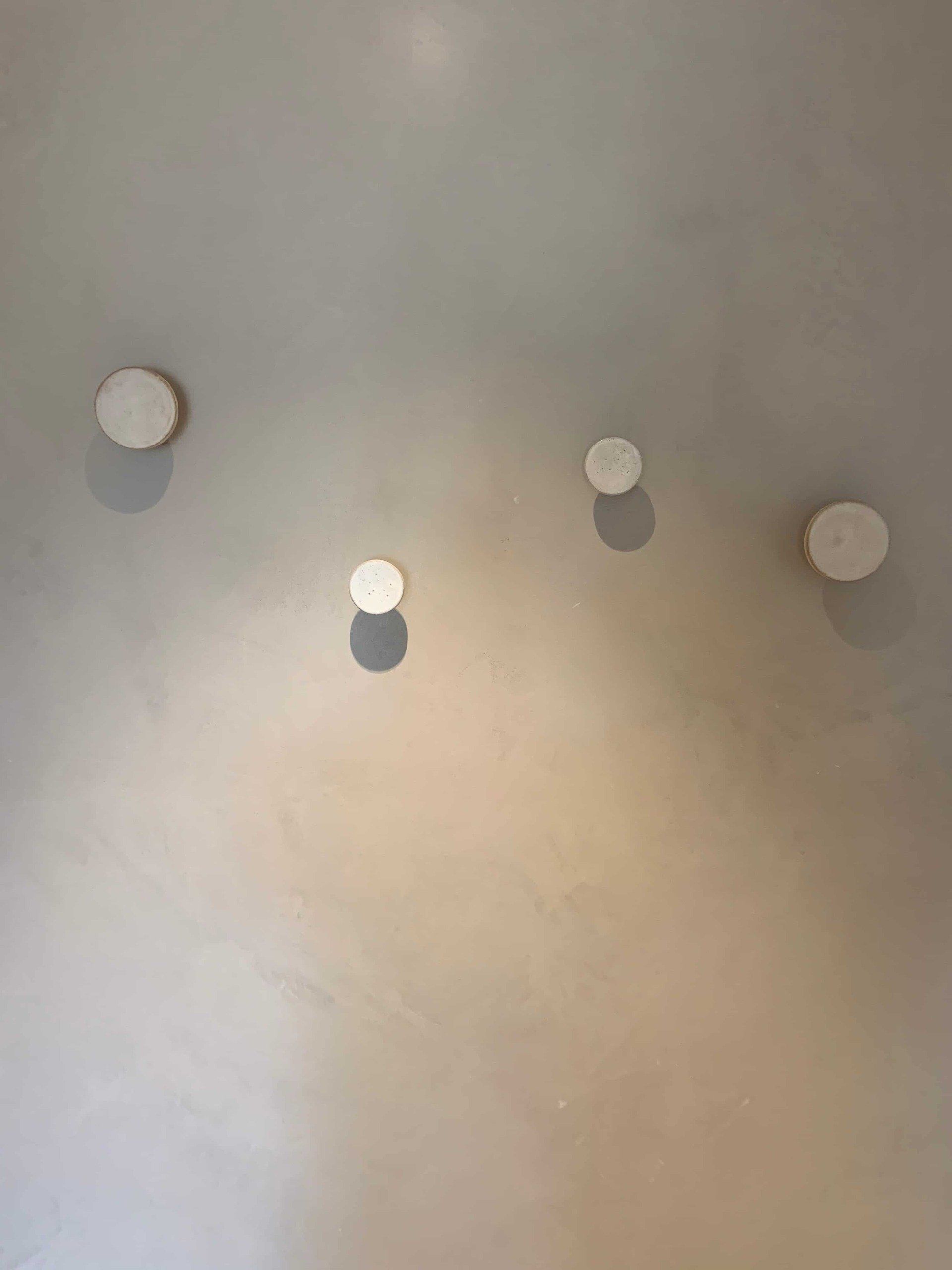 Rendered Wall With Hanging Hooks — Gallery in Byron Bay, NSW