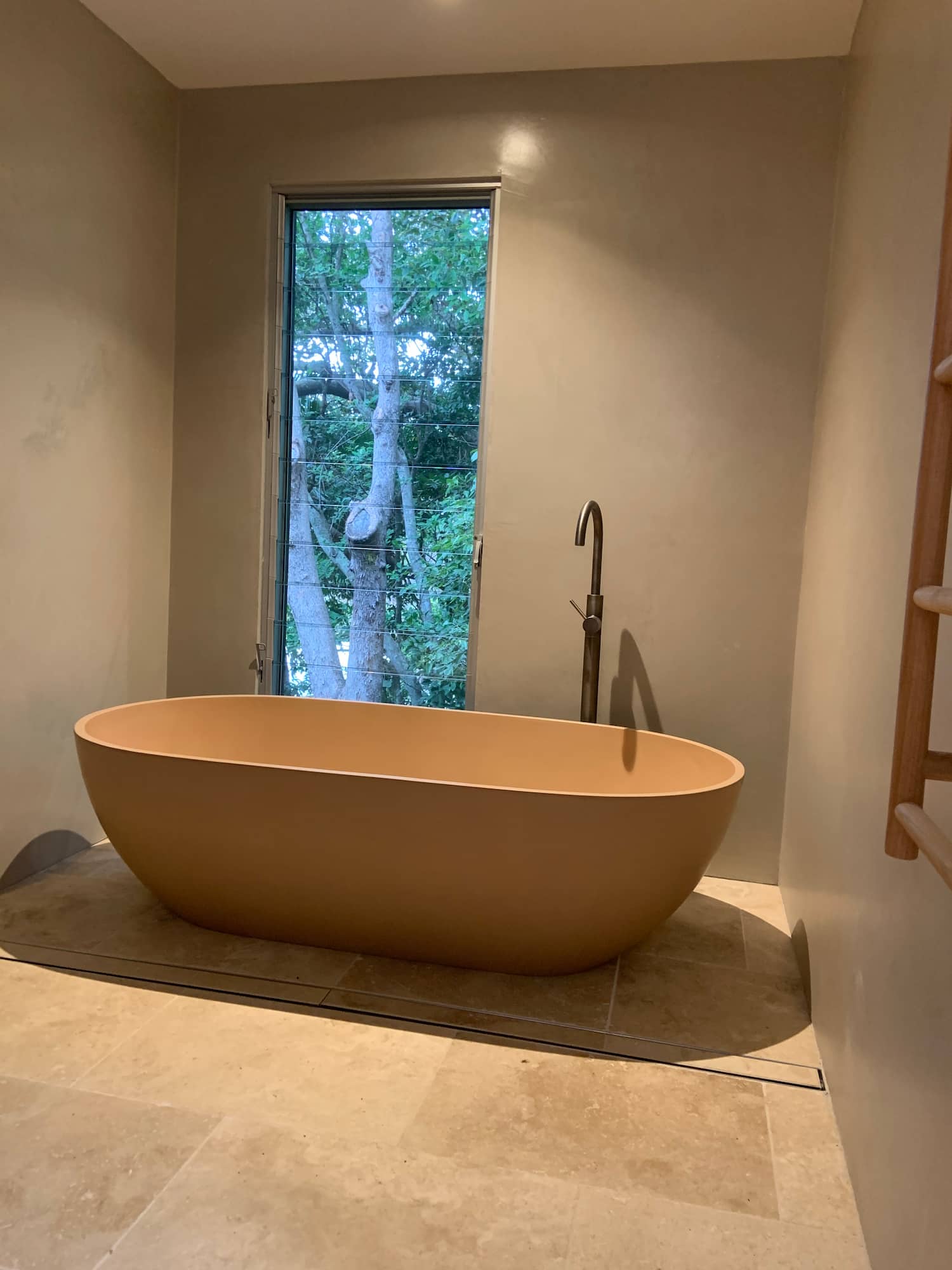 Large Brown Bath In Front Of Rendered Walls — Gallery in Byron Bay, NSW