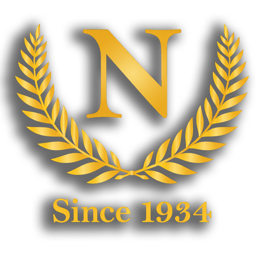 Gold "N" within a laurel wreath, with "Since 1934" below.