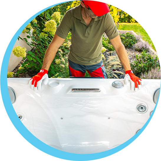 A man wearing red gloves is working on a hot tub