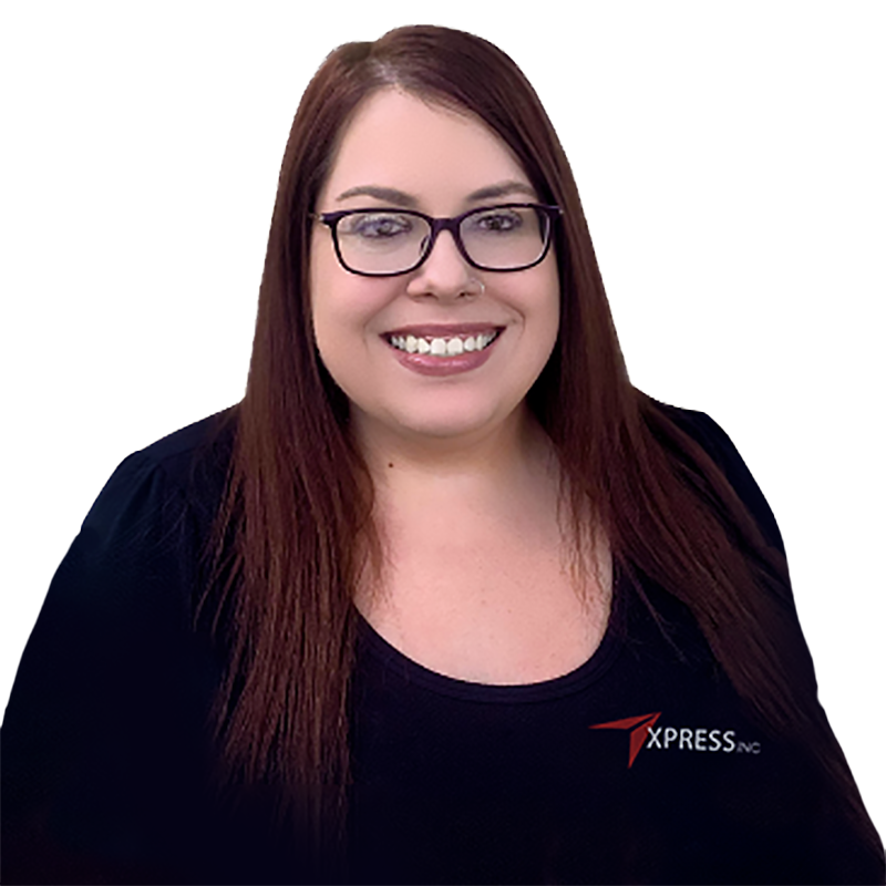 A woman wearing glasses and a black shirt is smiling for the camera.