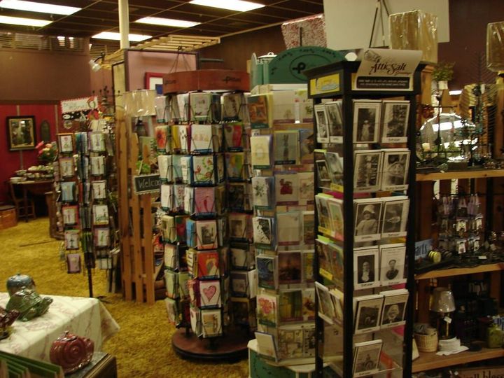 A store filled with lots of greeting cards and candles